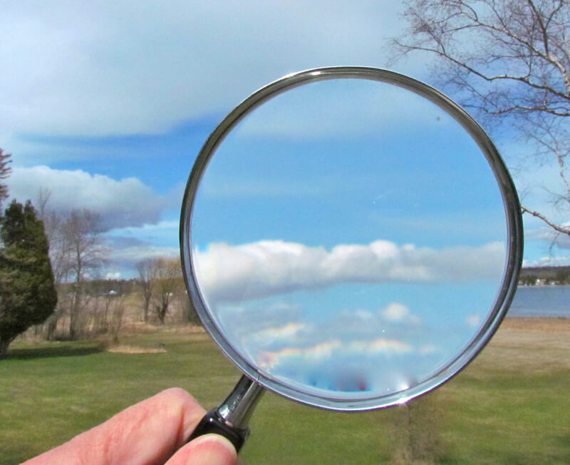 Magnifying clouds with a magnifying glass