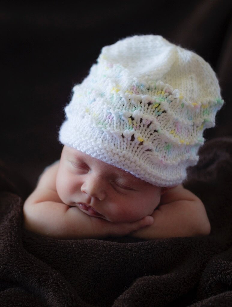 baby in big hat