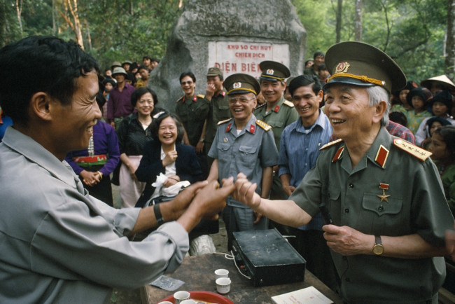 General Giap greets villagers after 40 years, in the forest near Điện Biên Phủ