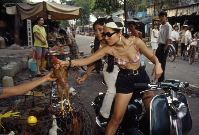 Overseas Vietnamese (Viet Kieu) return, bringing American style to Vietnam. 1994.