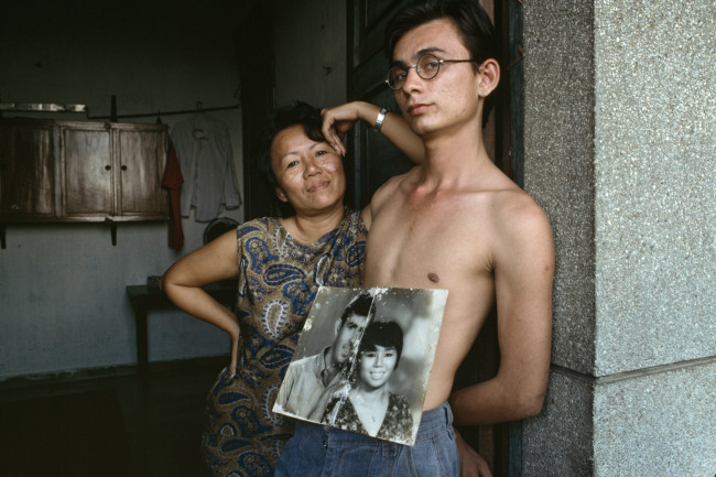 Amerasian boy with his Vietnamese mother; his US soldier father abandoned the family