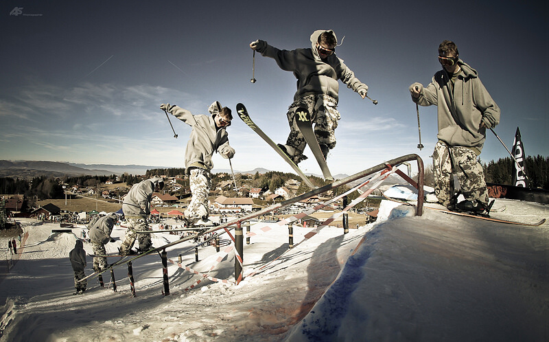 Skier grinding rail