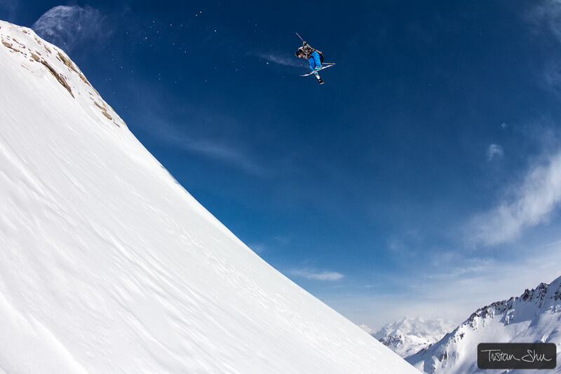 Skier doing a 360 tail grab