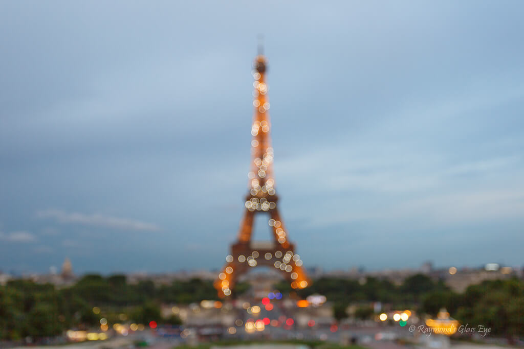 Raymonds Glass Eye - Eiffel Tower Bokeh