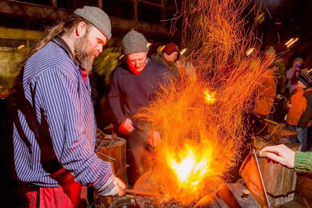 Ragnar Th. Sigurdsson - Blacksmith artist creating ironworks during the annual Winter Festival, Reykjavik, Iceland