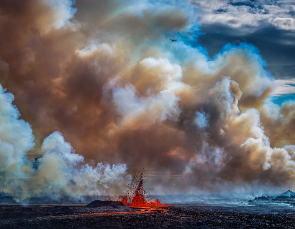 Ragnar Sigurdsson - Small plane flying over the volcano eruption at the Holuhruan Fissure, Bardarbunga Volcano, Iceland.