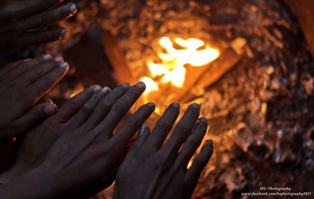 Harjeet Singh Narang - hands warming by the fire