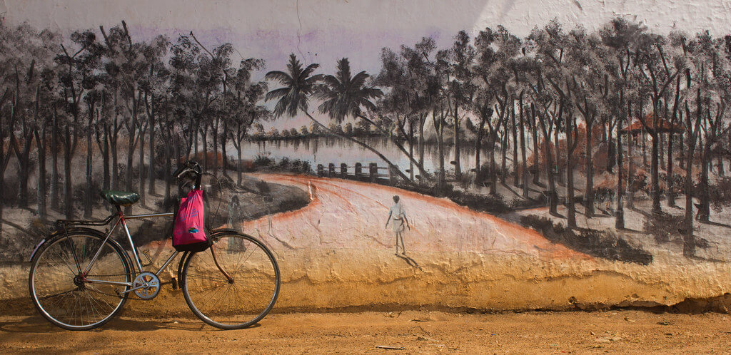 Praphul T - Bicycle against wall mural