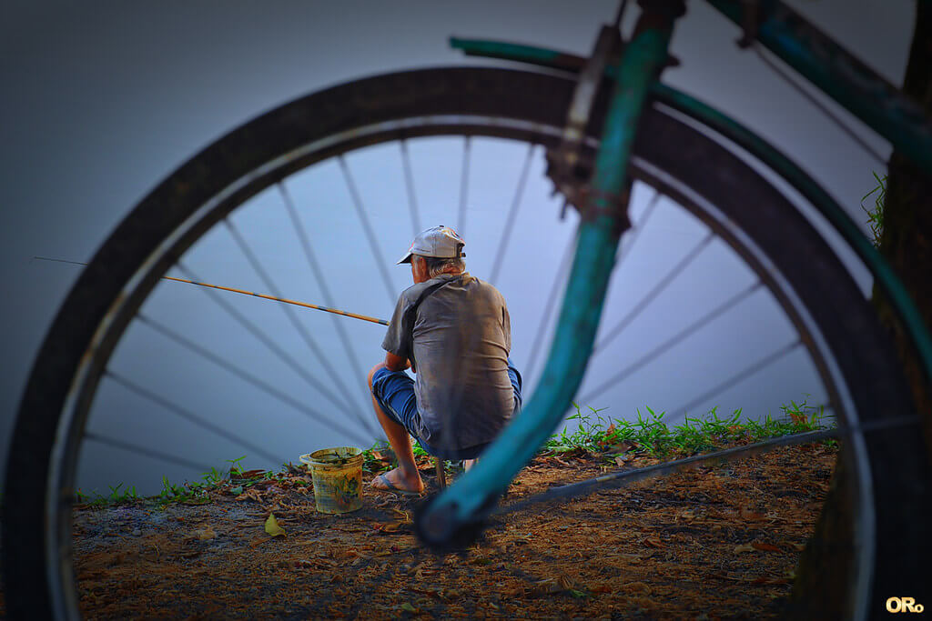 Otacílio Rodrigues - A fisherman and his bike