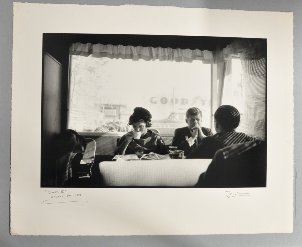 Sen. John F. Kennedy, Jacqueline Kennedy, and Stephen Smith (back facing camera) have a quiet Sunday morning breakfast after Mass while on the campaign trail in Oregon, 1959. This photo became one of Jacques Lowe's most requested images. © The Estate of Jacques Lowe.